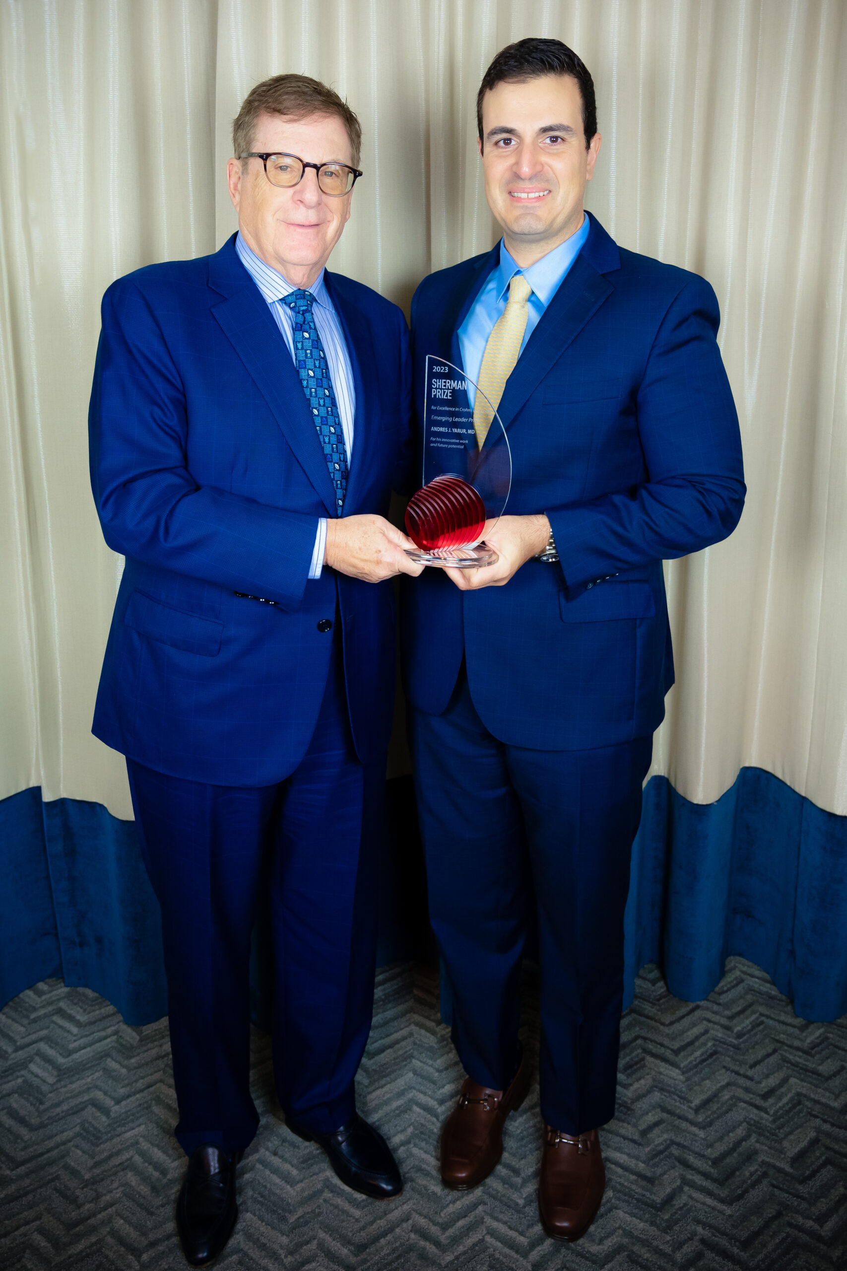 <p>Bruce S. Sherman and 2023 Sherman Emerging Leader Prize Recipient Andres J. Yarur, MD</p>
